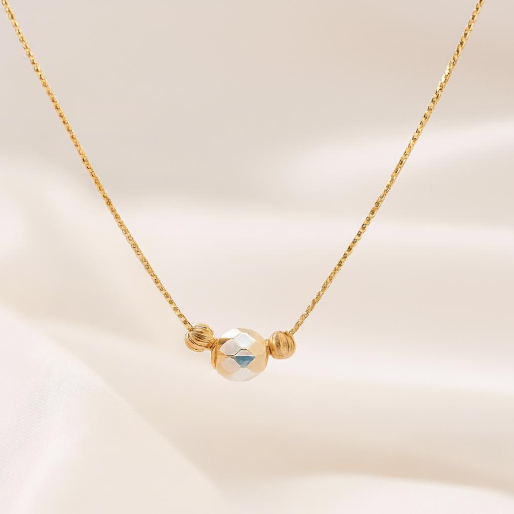 Gold Chain With Faceted Bead Pendant.