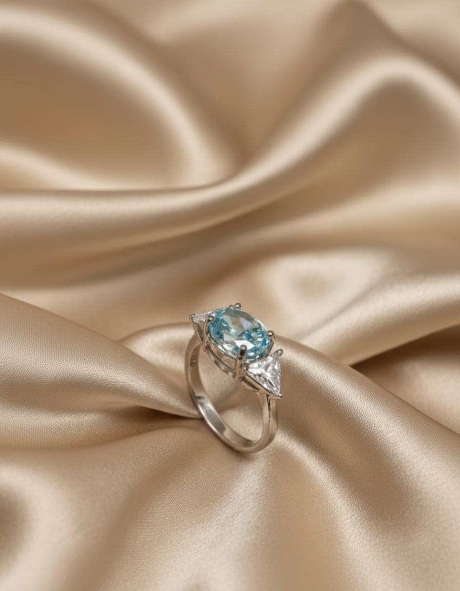 Blue Oval Cubic Zirconia And Trillion Accent Three-Stone Ring - Image 3