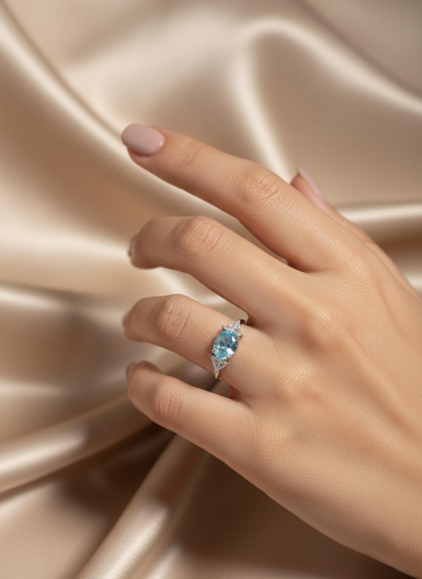 Blue Oval Cubic Zirconia And Trillion Accent Three-Stone Ring - Image 4